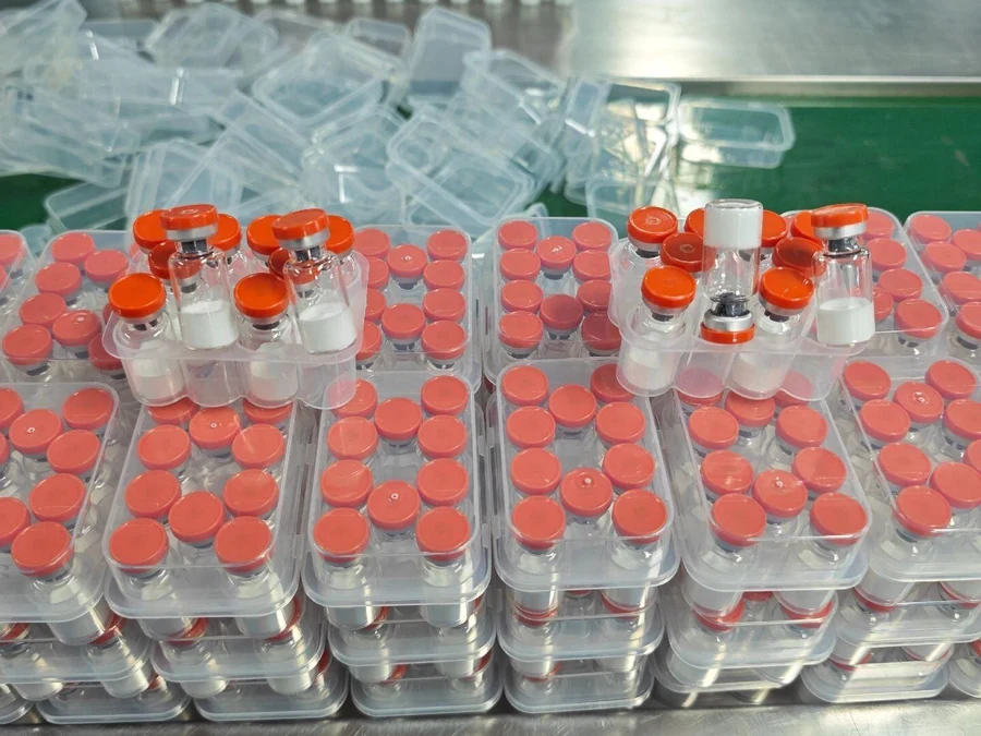 Client-authorized photograph of vials and packaging; no SKU or batch mapping asserted